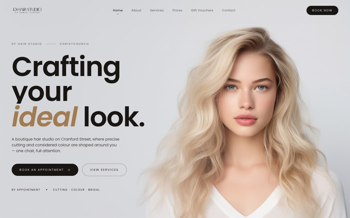The DF Hair Studio home page, with the headline 'Crafting your ideal look' beside a portrait.